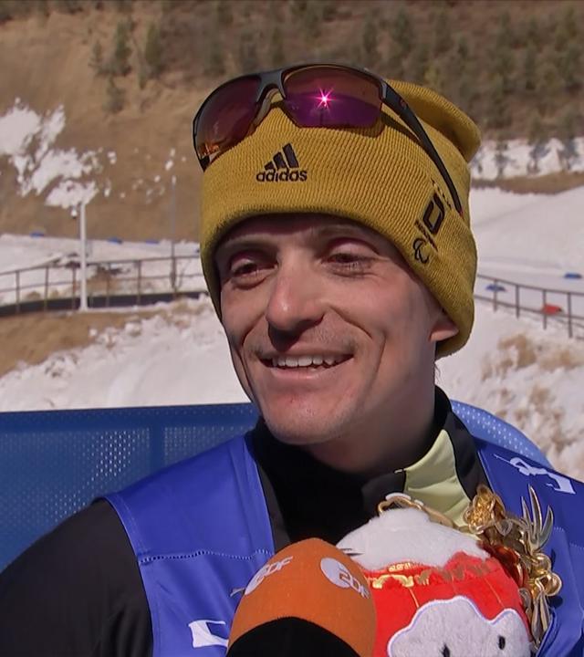 Martin Fleig nach seinem Silbermedaillenerfolg im Biathlon