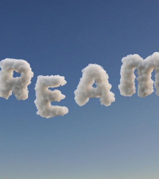 Schriftzug Dreams in Wolkenform
