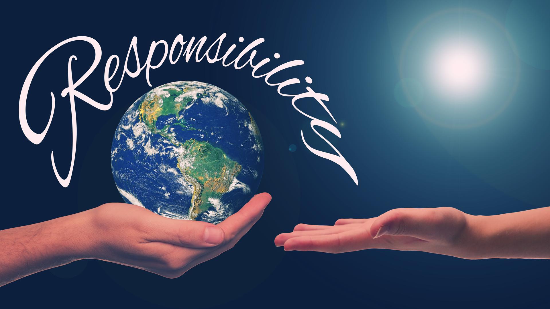 Hände halten eine Erkugel - darüber steht Responsibility