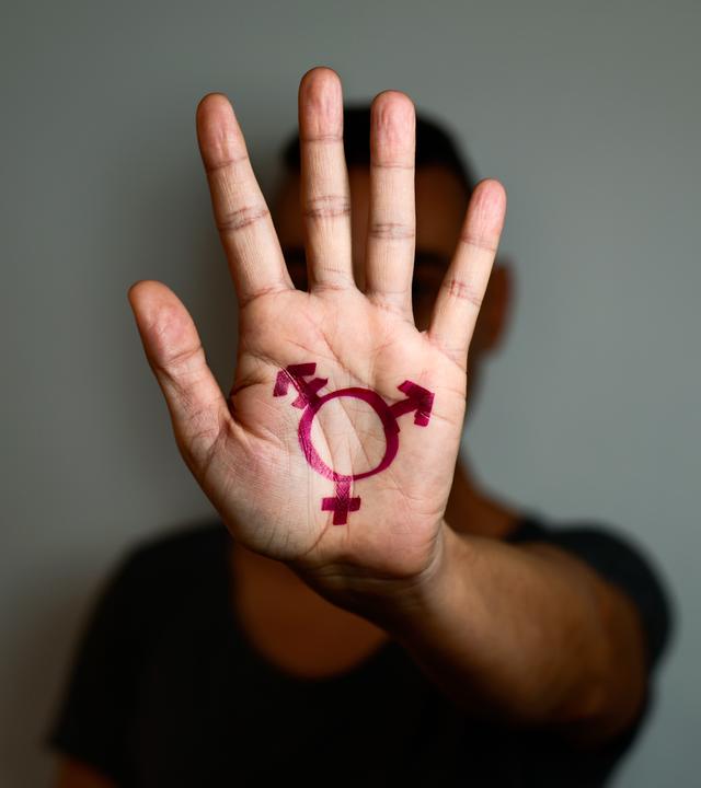 trangender Symbol auf einer Hand