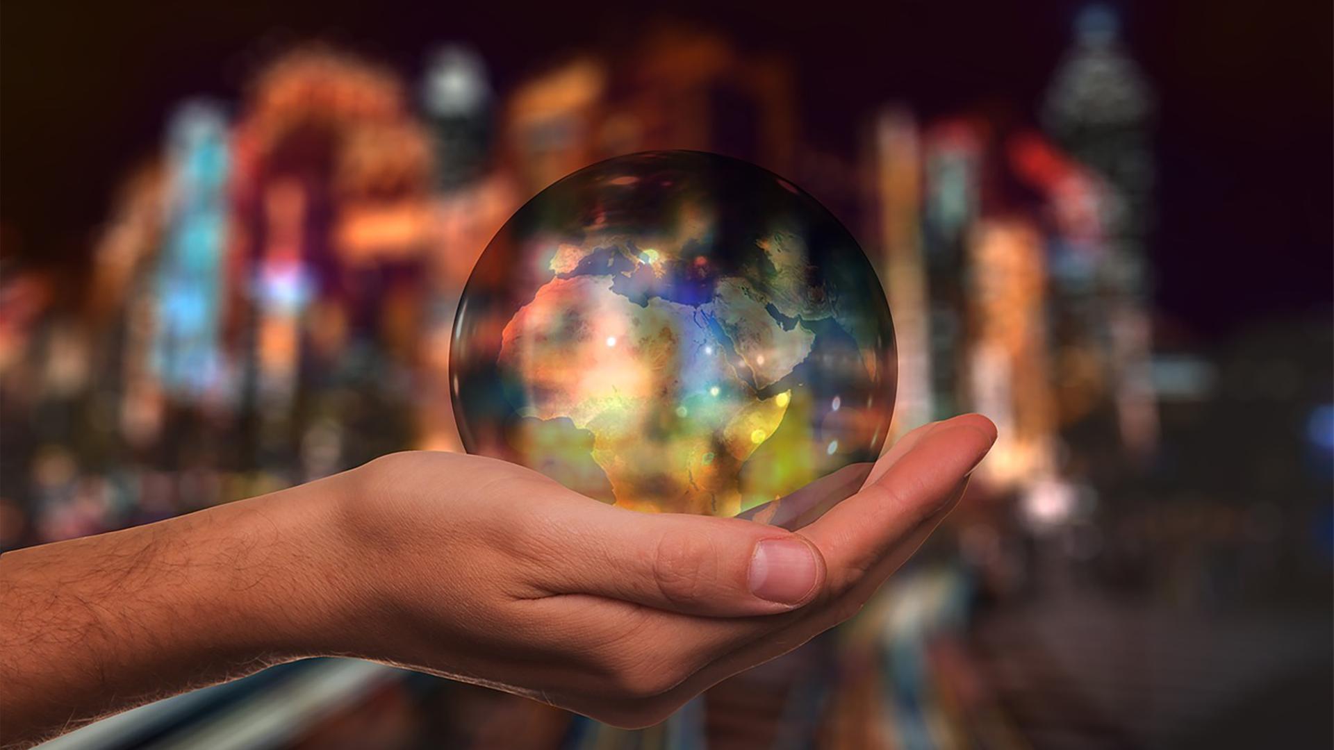 Globus in einer Hand