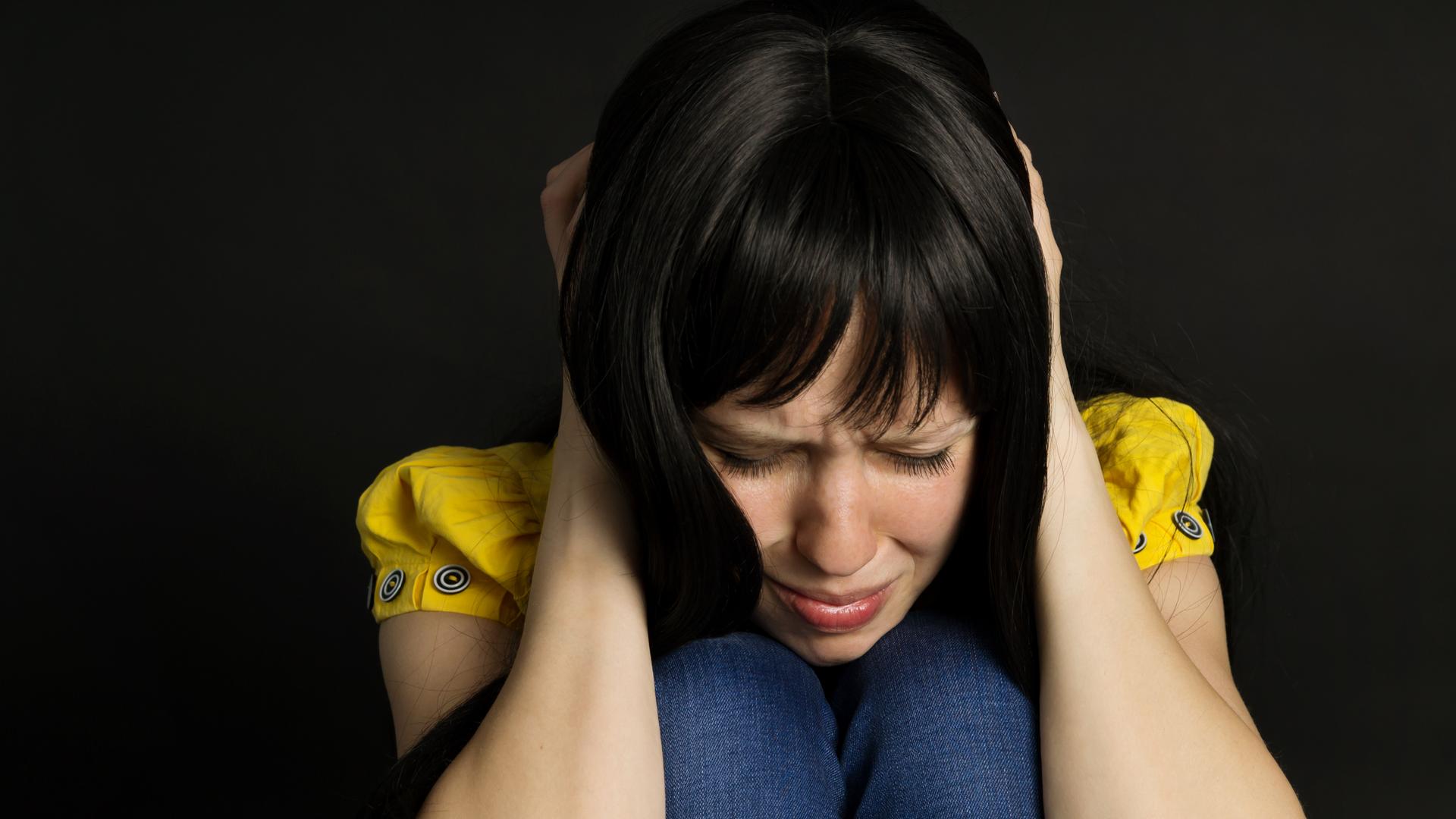 Junge Frau mit Depressionen