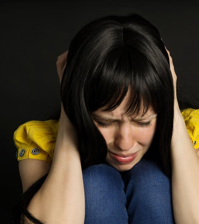 Junge Frau mit Depressionen