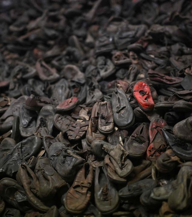 Shoes at the Auschwitz museum are pictured on the sidelines of commemorations on the 80th anniversary of the liberation of the German Nazi concentration and extermination camp Auschwitz-Birkenau by the Red Army, in Oswiecim, Poland on January 27, 2025. (Photo by Victoria JONES / POOL / AFP)