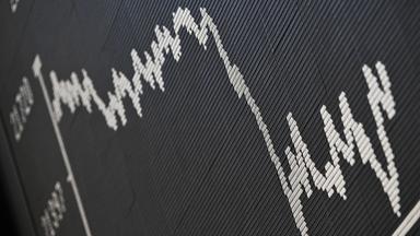 Frankfurt securities exchange ‍scoreboard showing falling courses.