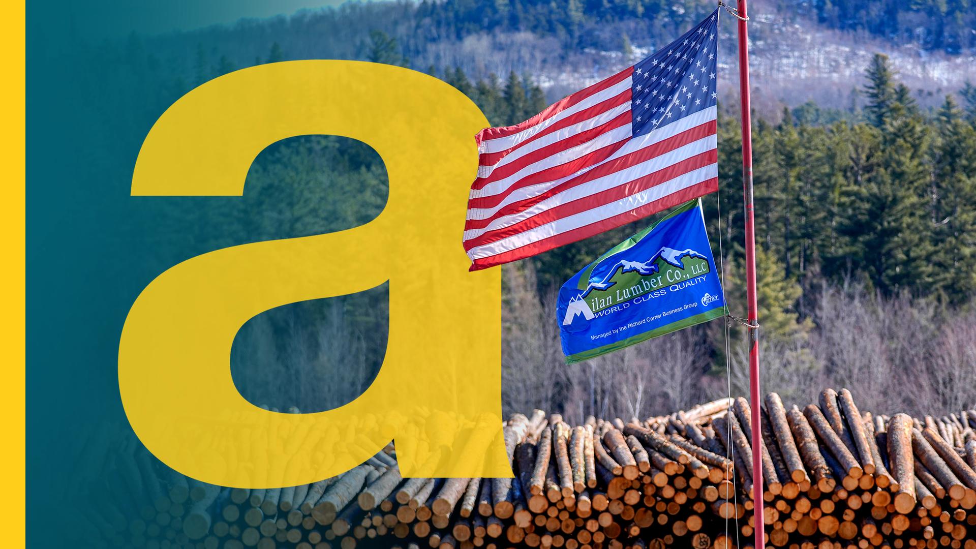 Ein Fahnenmast mit der amerikanischen Flagge steht vor einem Stapel Holzscheite