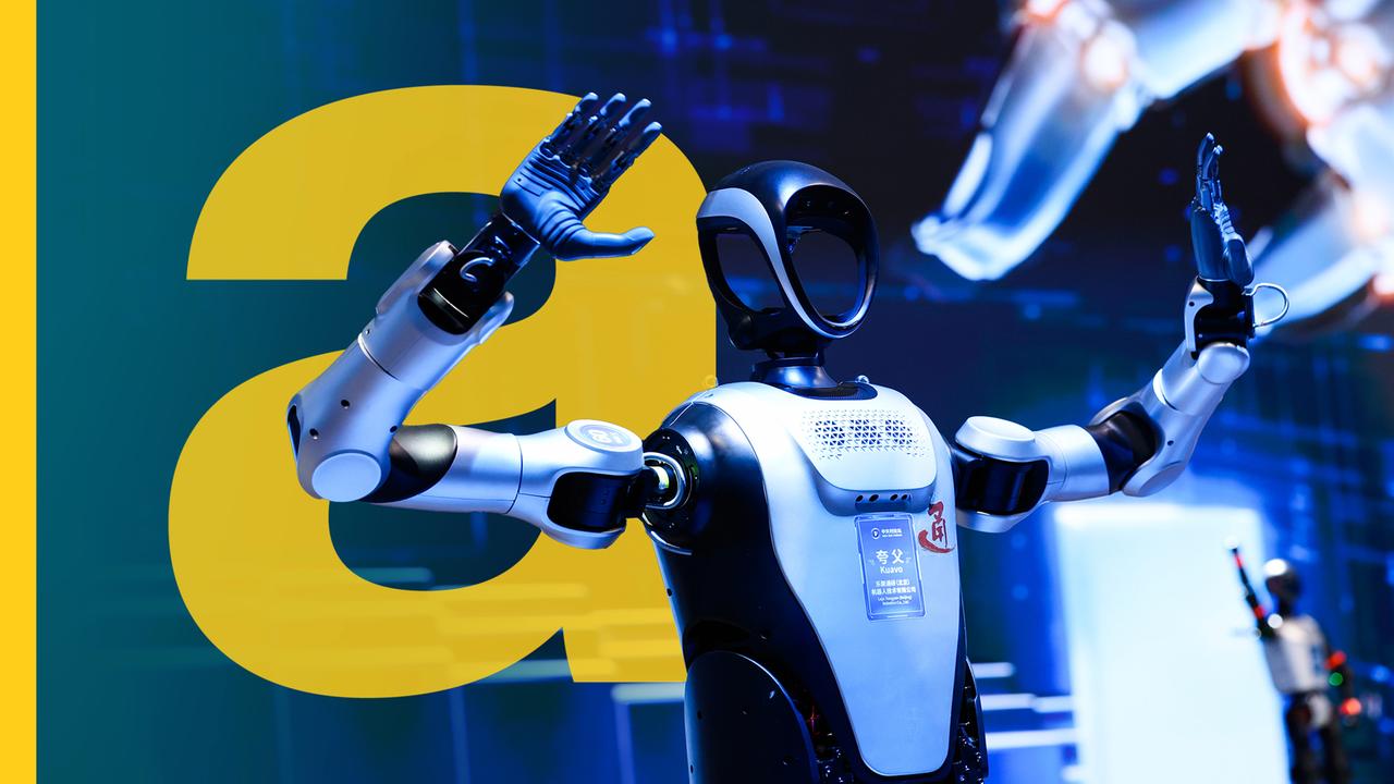 Robot with raised hands in front of yellow A