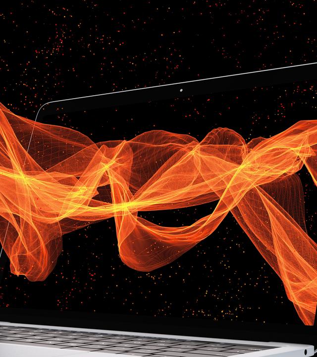 1927 überraschte Werner Heisenberg selbst Einstein: Seine Unschärferelation zeigte Grenzen des Messbaren – und macht erst Smartphones, Chips und unsere digitale Welt möglich. (Bild zeigt Laptop mit sybolischen Wellen)