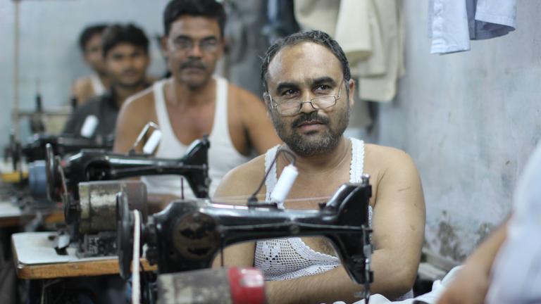 Näher in einer Textilfabrik in Indien