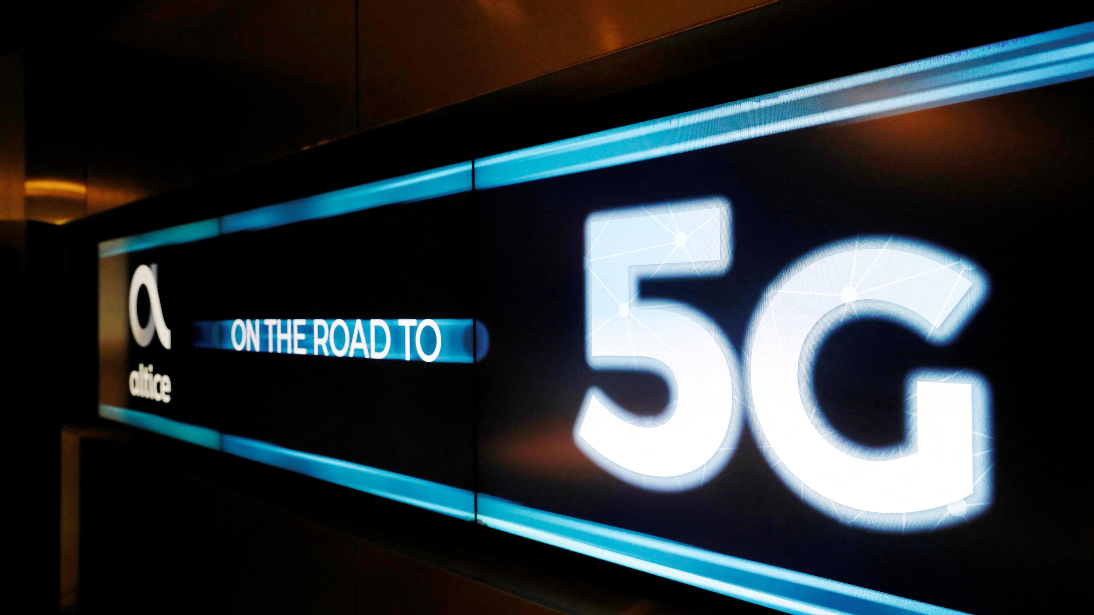 FILE PHOTO: An advertising board is seen during the first demonstration of the technology 5G in Lisbon, Portugal June 4, 2018. 