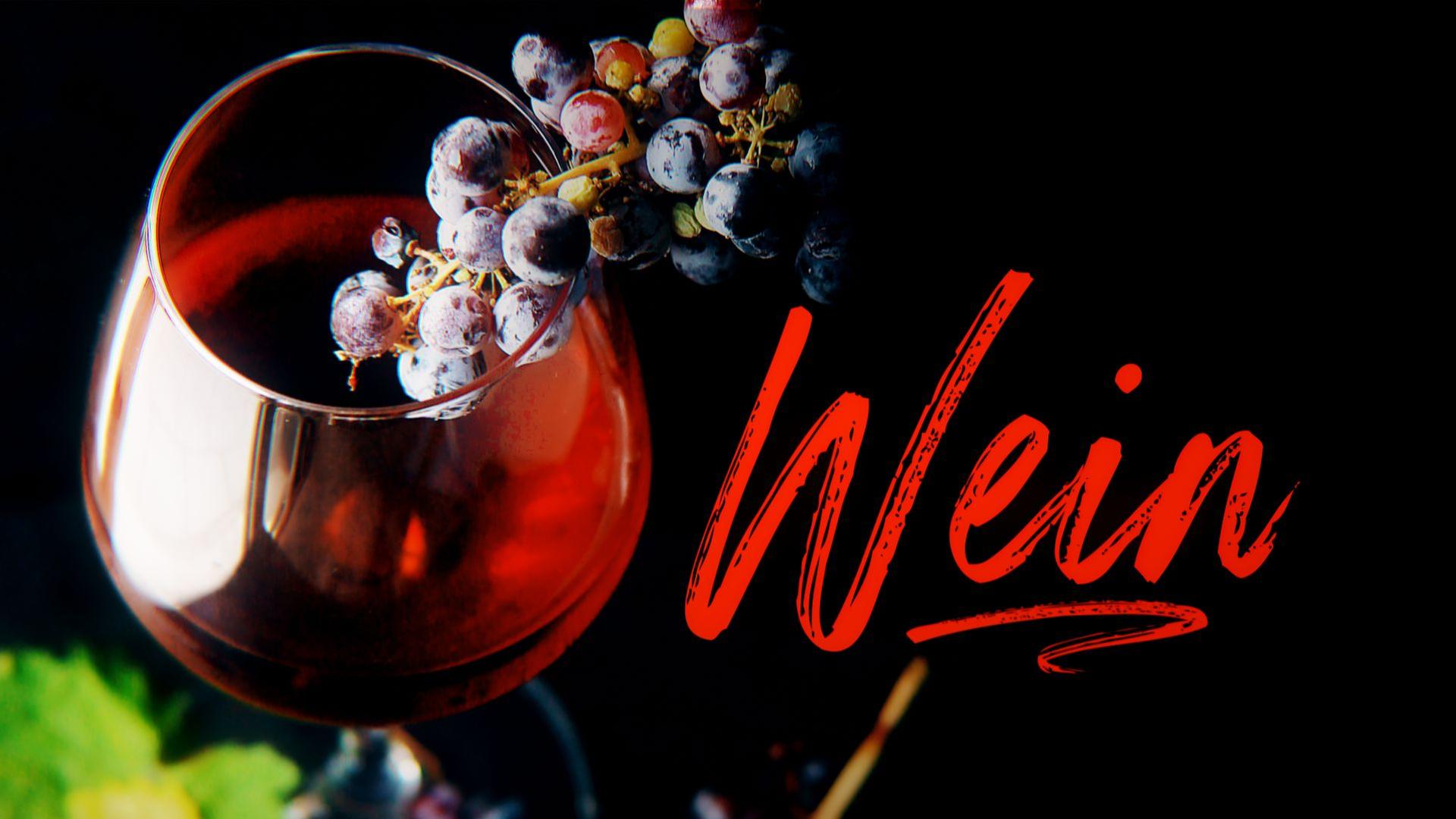 Weinglas mit roten Weintrauben und Titelgrafik "Wein"