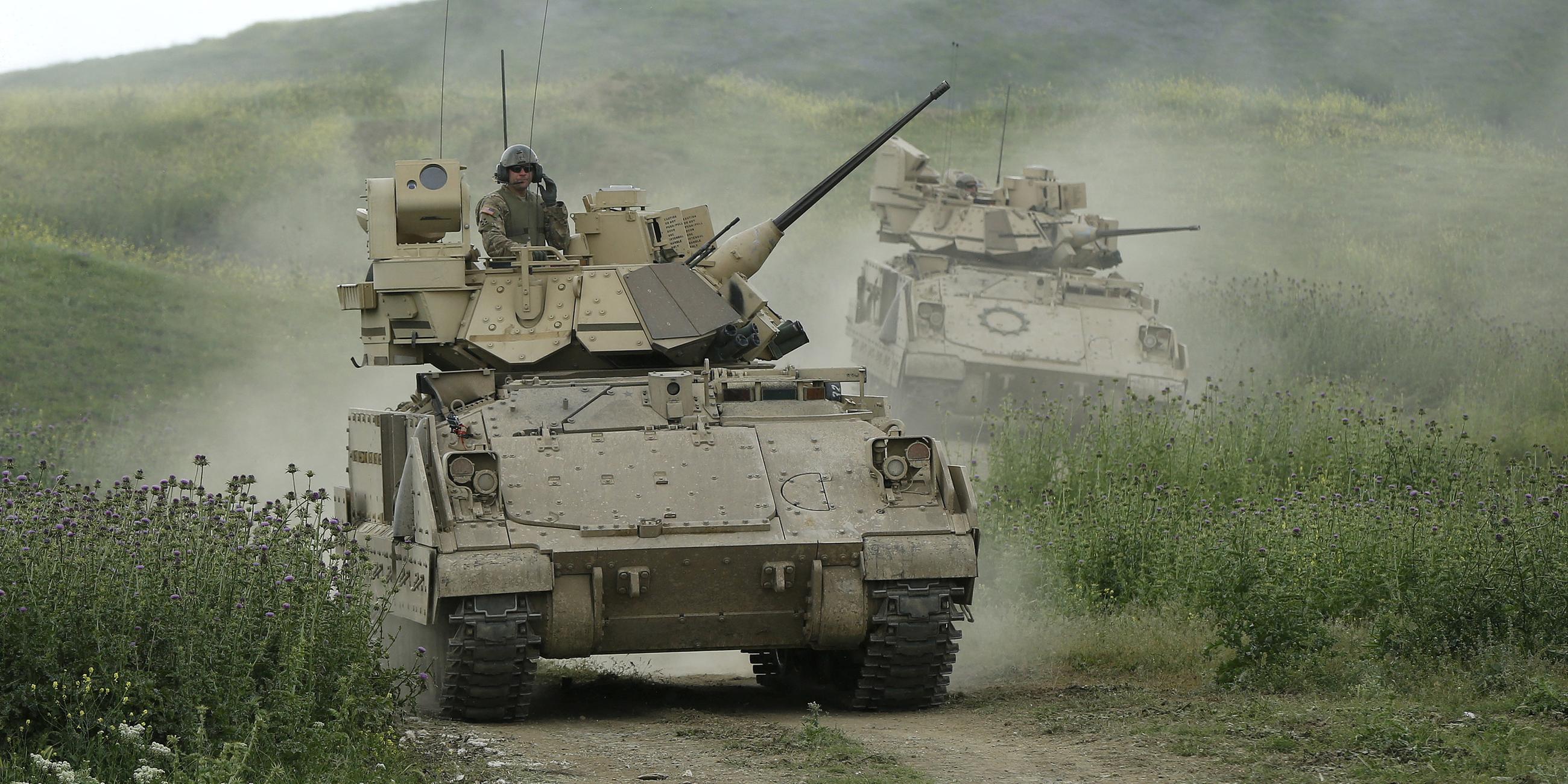 FILE PHOTO: U.S. servicemen drive Bradley infantry fighting vehicles during the joint U.S.-Georgian exercise Noble Partner 2015 