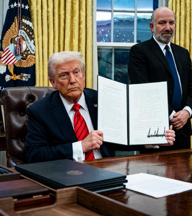 US President Trump signs executive order in Oval Office