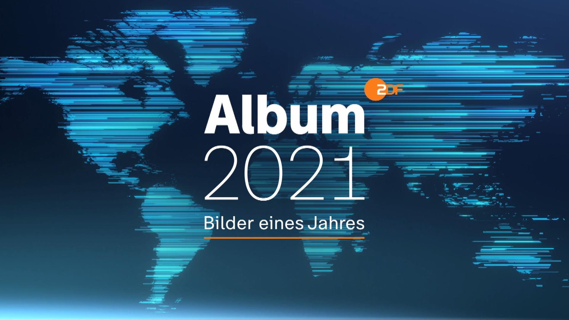 Die weltkarte auf einem dunkelblauen Hintergrund mit der Schrift Album 2021 - Bilder eines Jahres