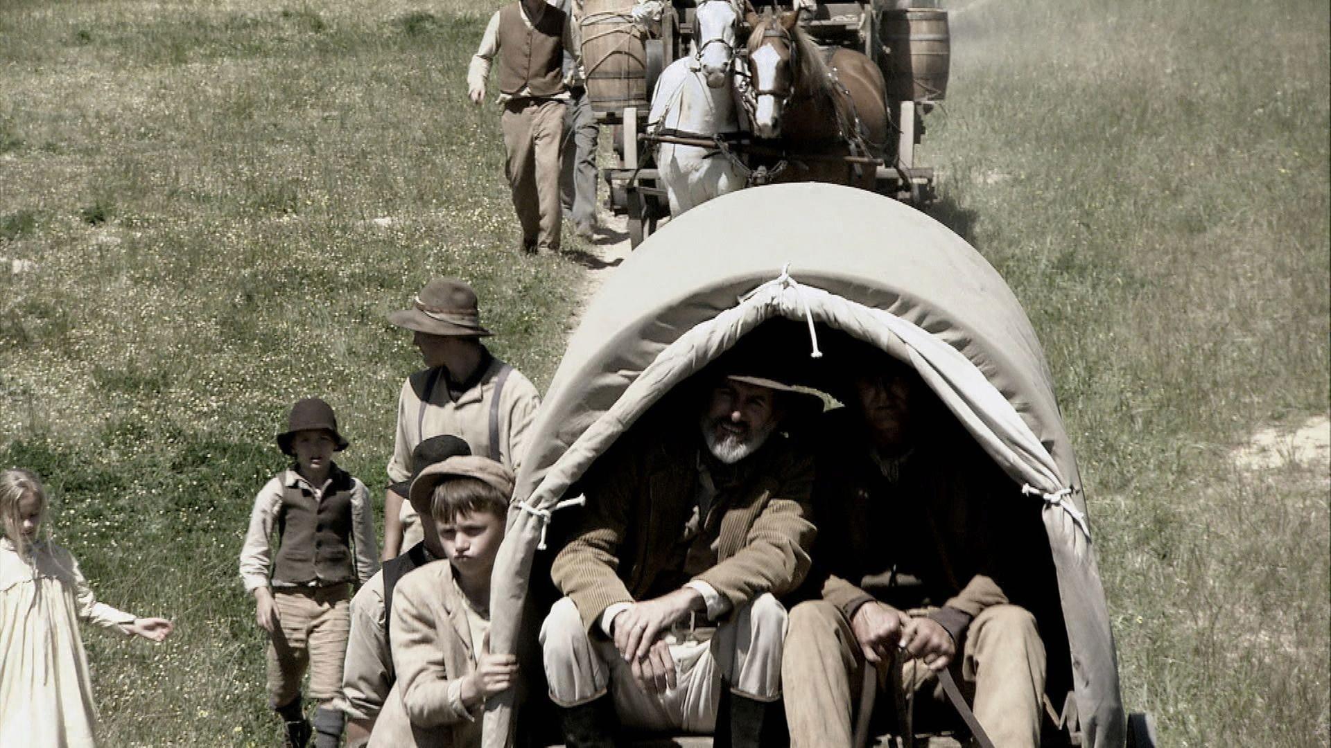 Eine Wagenkolonne amerikanischer Siedler auf dem Weg nach Westen.