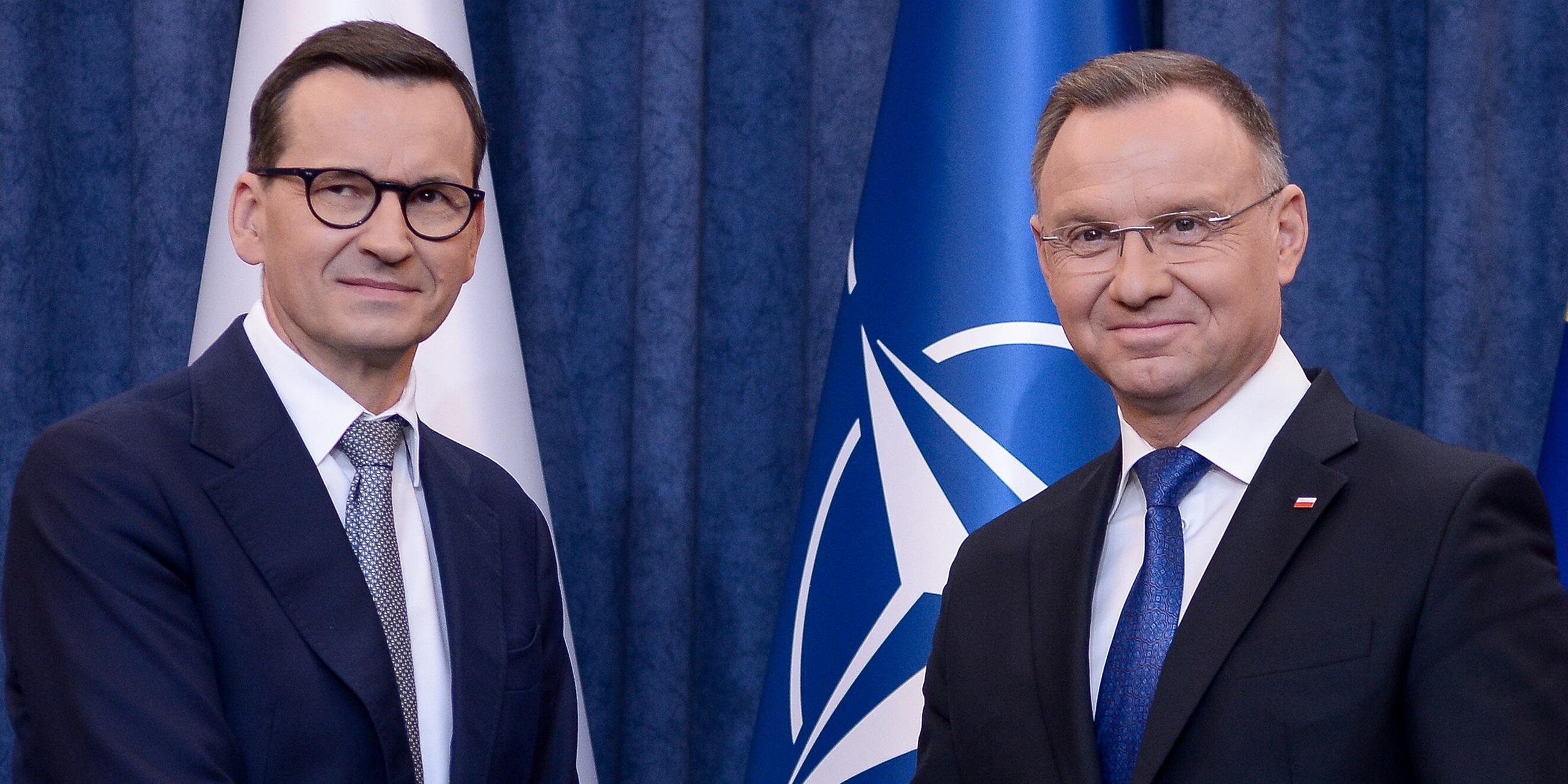 Archiv: Andrzej Duda und Mateusz Morawiecki geben eine Presseerklärung über den Migrationspakt ab im Präsidentenpalast. (05.10.2023)