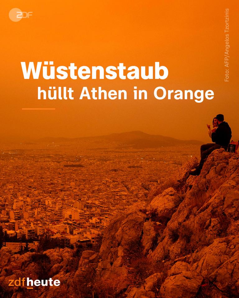 Die Stadt Athen ist von Weitem aus der Luft zu sehen. Der Himmel ist orange von Wüstenstaub.