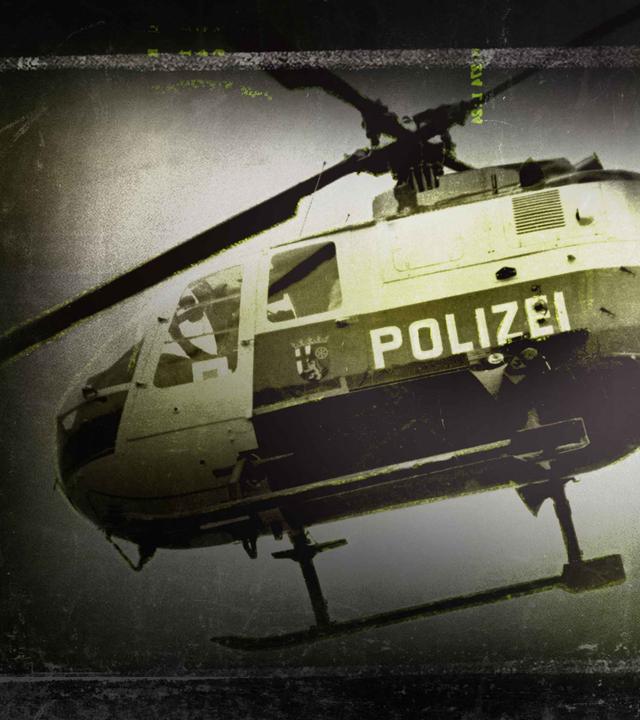 Ein Polizeihubschrauber, das Bild ist gelblich gehalten