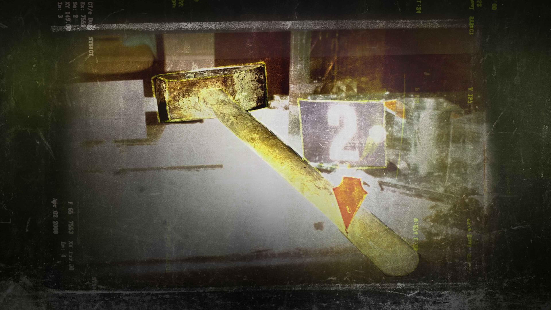 Ein gelb leuchtender Hammer auf einem Tisch mit einer zwei markiert