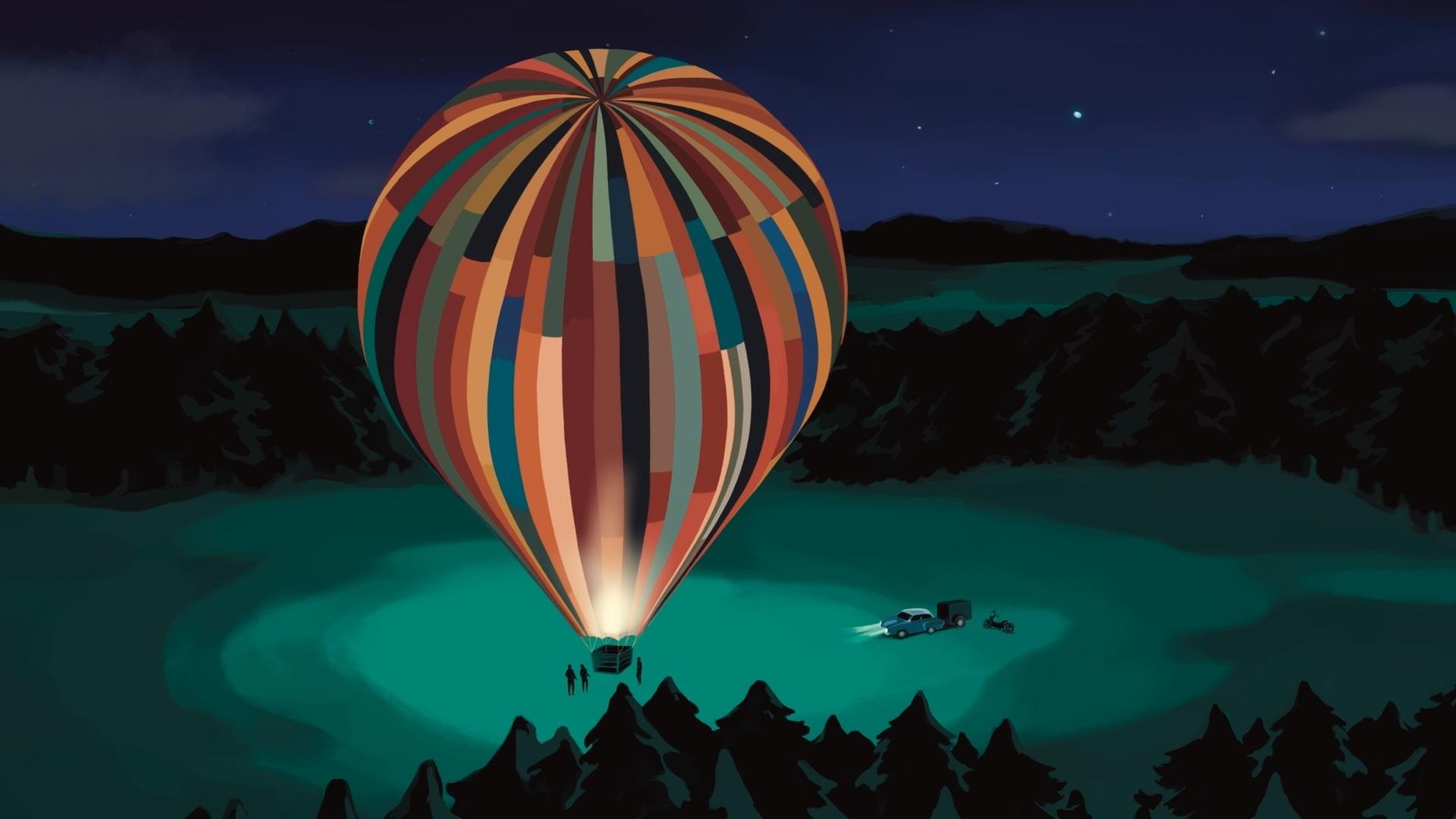 Zeichnung: In einer Waldlichtung steht nachts ein großer, bunter Heißluftballon, gefertigt aus vielen verschiedenfarbigen Stoffbahnen. Im Hintergrund steht ein Auto mit eingeschalteten Scheinwerfern.