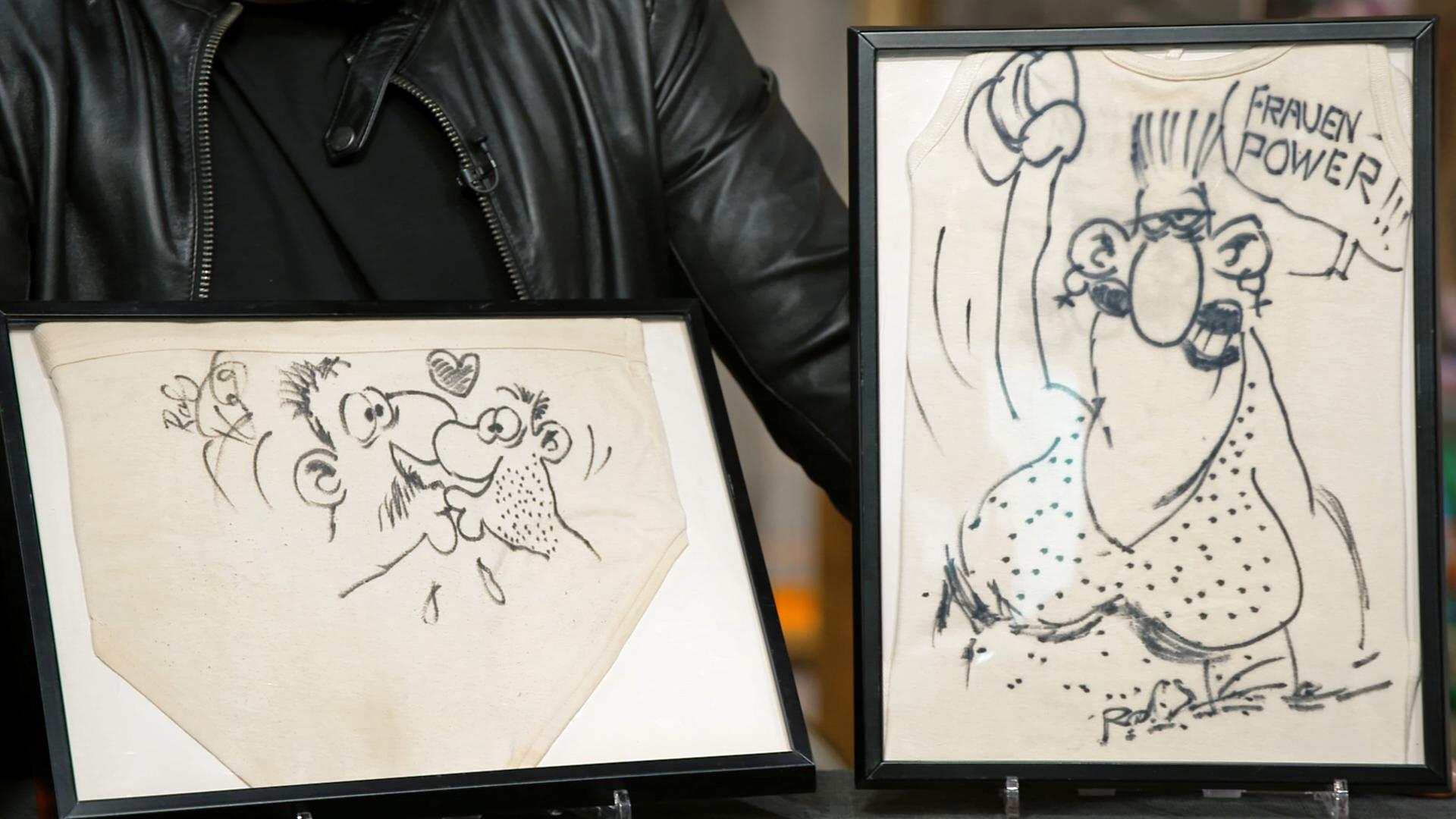 Auf Unterwäsche gezeichnete Karikaturen von Ralf König 
