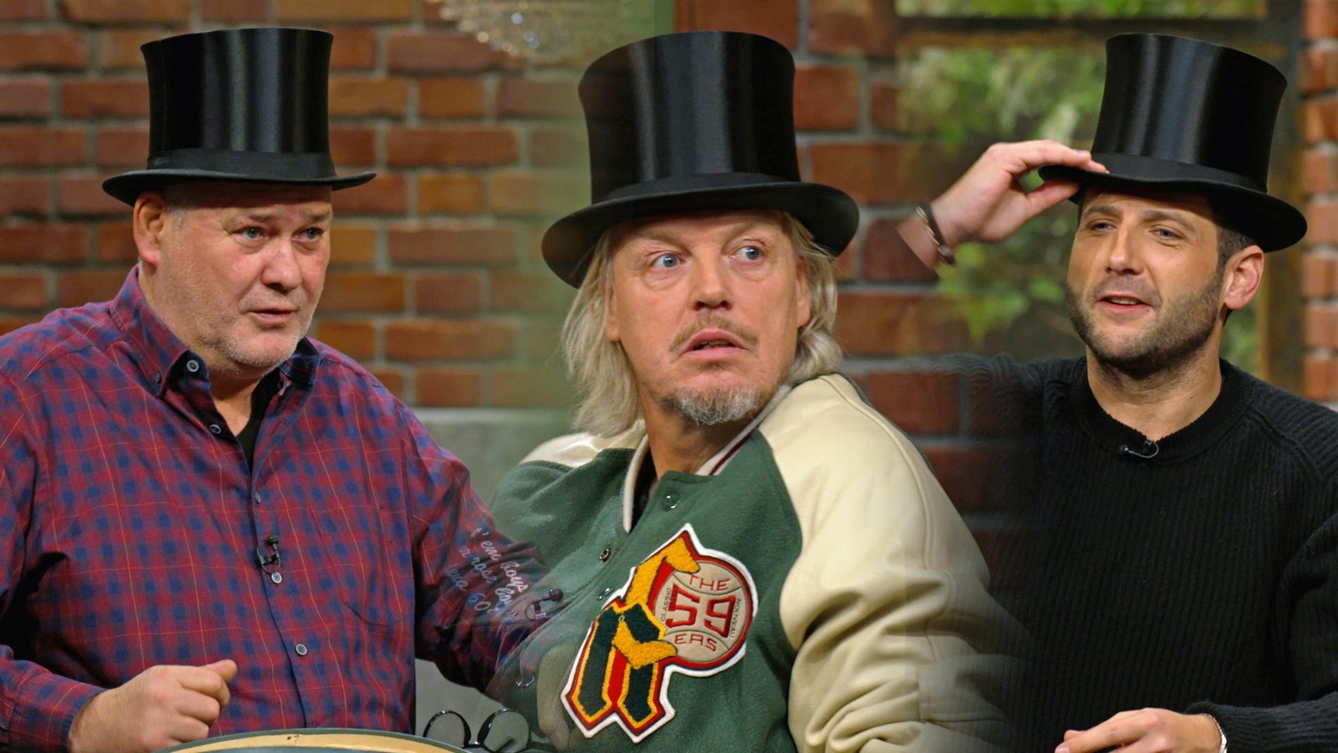 Die Händler Waldi, Jos und Julian mit einem alten Chapeau Claque