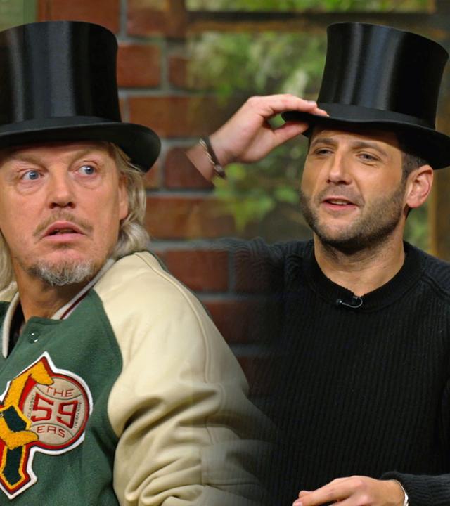 Die Händler Waldi, Jos und Julian mit einem alten Chapeau Claque