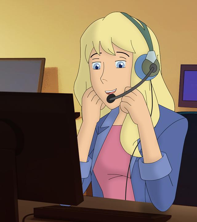 Gaby sitzt mit Headset auf dem Kopf vor einem Computer.