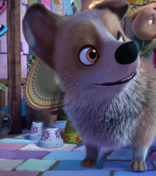 Vor Señora Marias Chili Restaurant steht Hund Butterblume mit dem Gärtner auf seinem Rücken. Der Gärtner blickt sich um zu Señora Maria, die im Eingang steht.