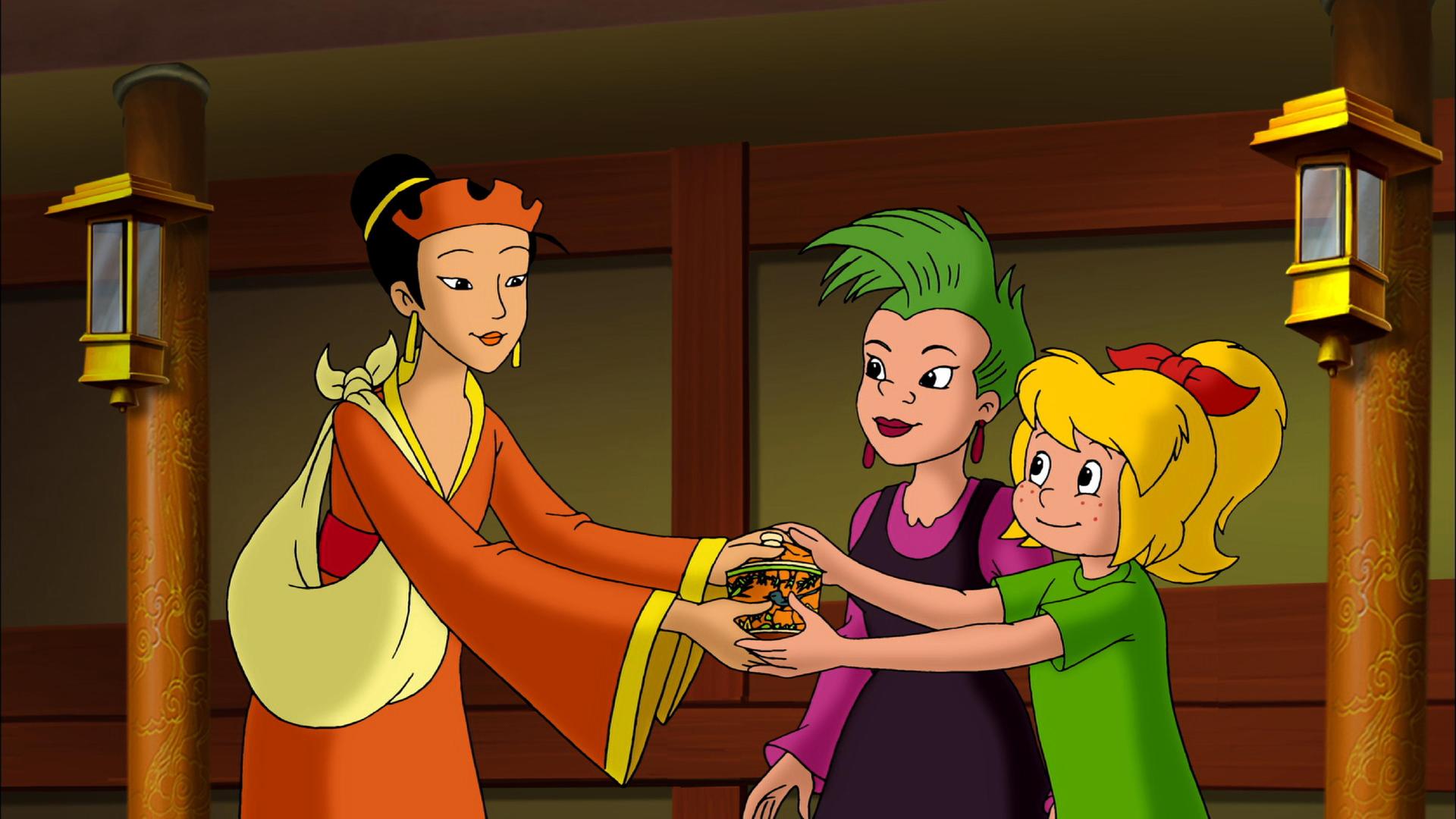 Bibi bekommt den Heilsalbentopf von der Kaiserin überreicht. Schubia steht hinter Bibi.