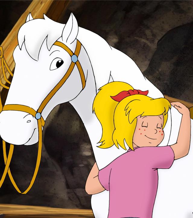 Bibi umarmt ihr Pferd Sabrina.