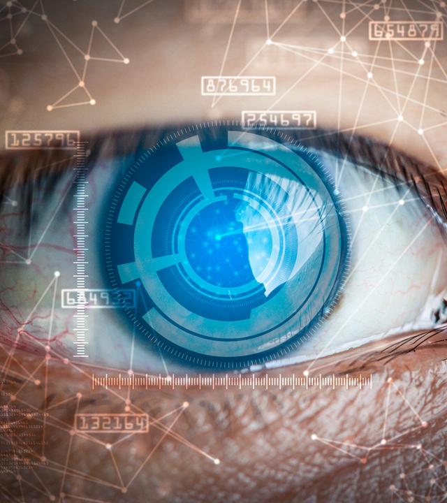 Ein Auge, dessen Pupille mit technischen Elementen gefüllt ist. 