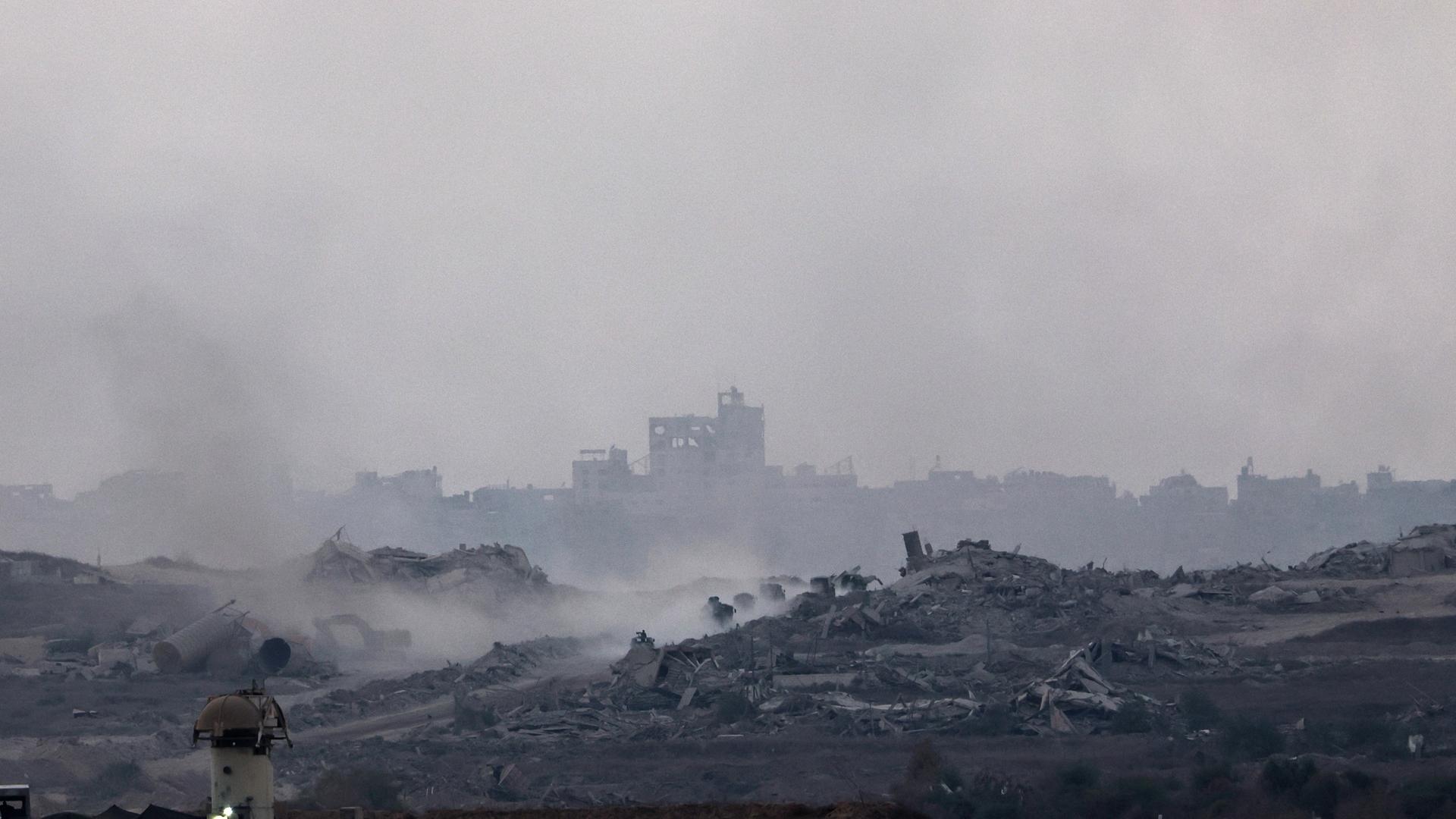Smoke rises as a result of an Israeli airstrike on the outskirts of Gaza City, as seen from an undisclosed location on the Israeli side of the border, 15 September 2025