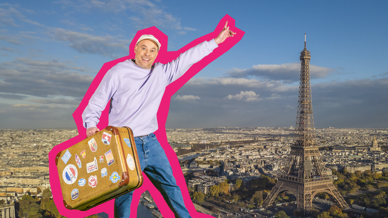 Auf dem Foto ist das pink umrandete Bild vom Sänger Tobi Polar zu sehen, der einen braunen Koffer in der Hand hält und seinen Zeigefinger ausstreckt. Im Hintergrund sieht man eine Luftaufnahme von Paris, auf der zentral der Eiffelturm zu erkennen ist.
