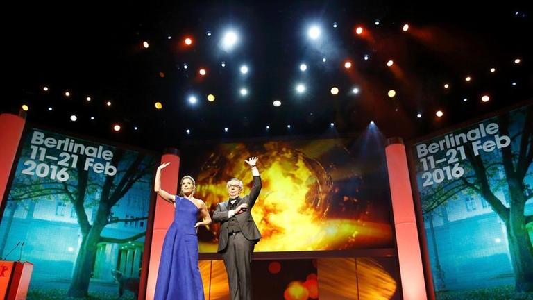 actress anke engelke and festival director dieter kosslick (r) talk to audience during the opening gala of the 66th berlinale international film festival, in berlin, germany february 11, 2016.        reuters/fabrizio bensch