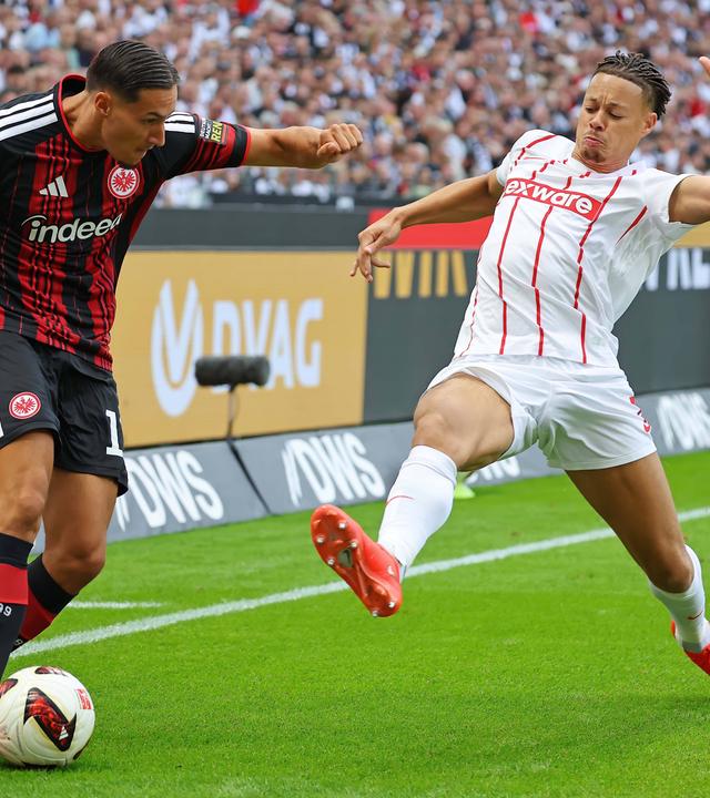 Younes Ebnoutalib (Frankfurt) gegen Derry Scherhant (SCF) im Zweikampf am 19.09.2026 in Frankfurt. 