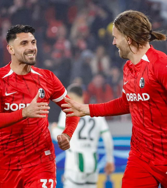 Freiburgs Lucas Höler jubelt nach seinem Tor mit Vincenzo Grifo.