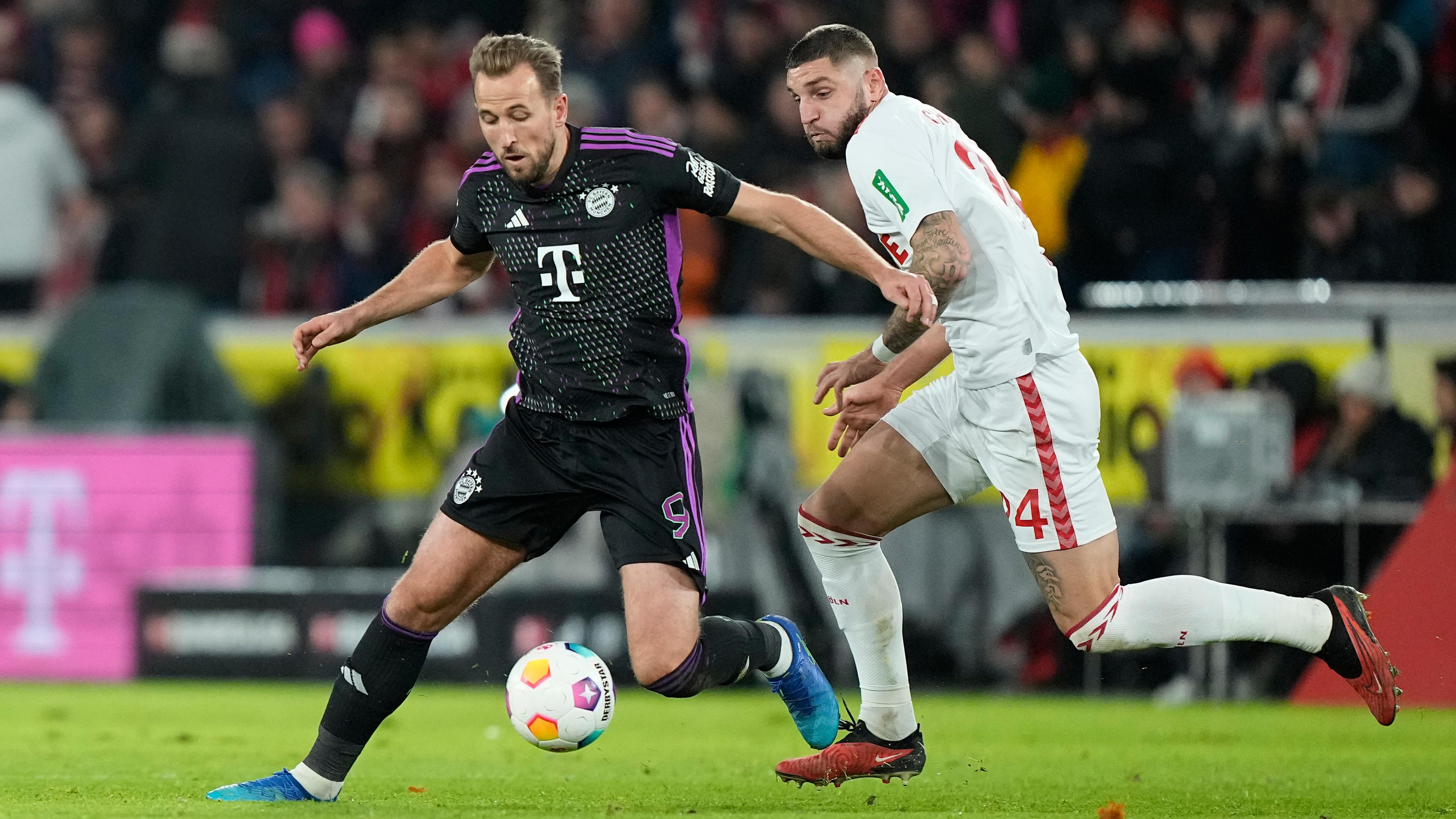 Bayerns Torschütze Harry Kane im Duell mit Kölns Julian Chabot