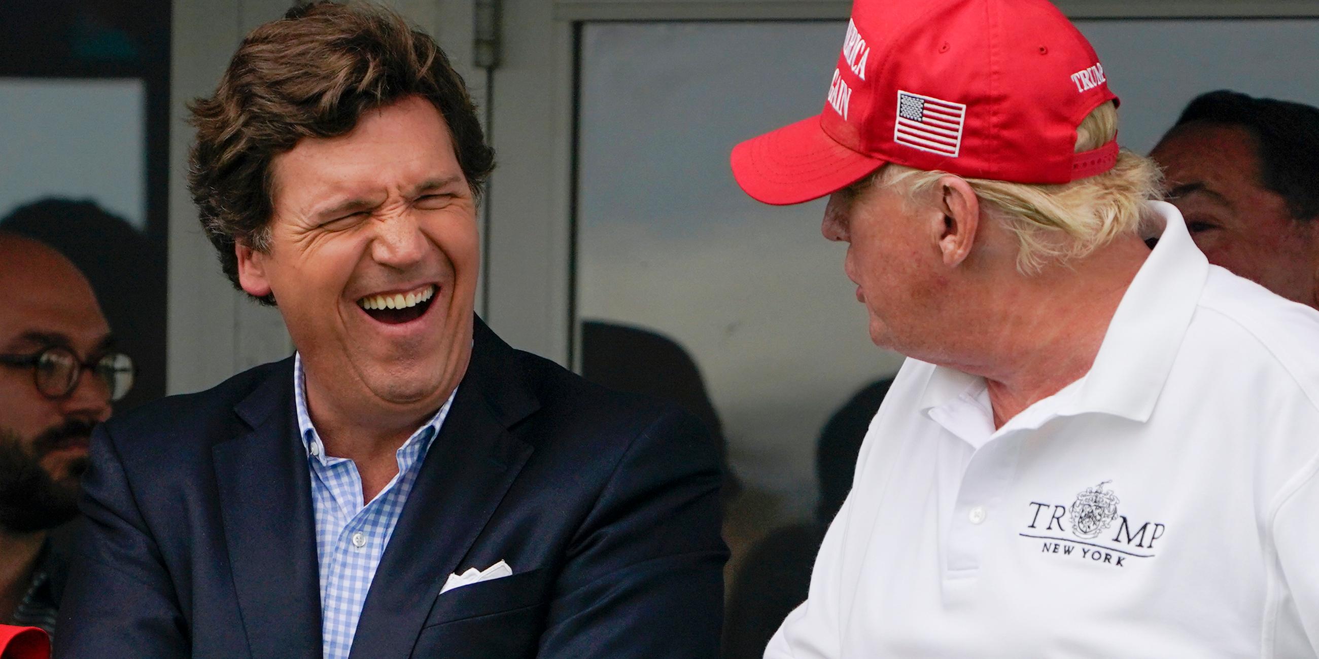 Archiv: Tucker Carlson (l), konservativer Fernsehmoderator, und Donald Trump