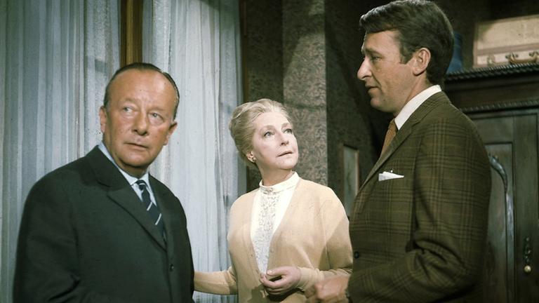 "Der Kommissar: Toter Herr im Regen": Erik Ode (l.) als Kommisssar Keller, Dorothea Wieck und Günther Schramm als Kellers Assistent Grabert.