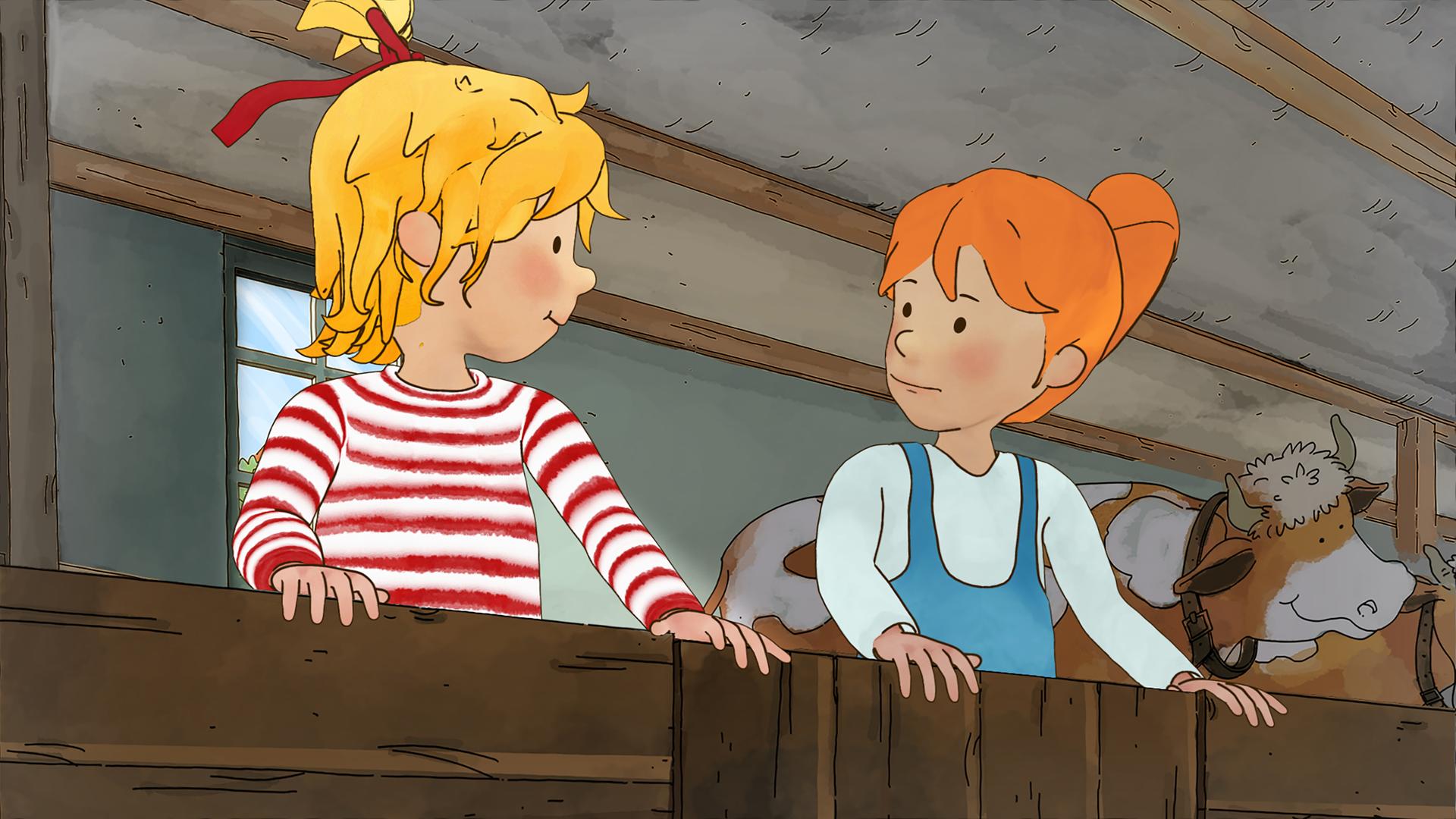 Conni mit Annika im Kuhstall auf dem Bauernhof.