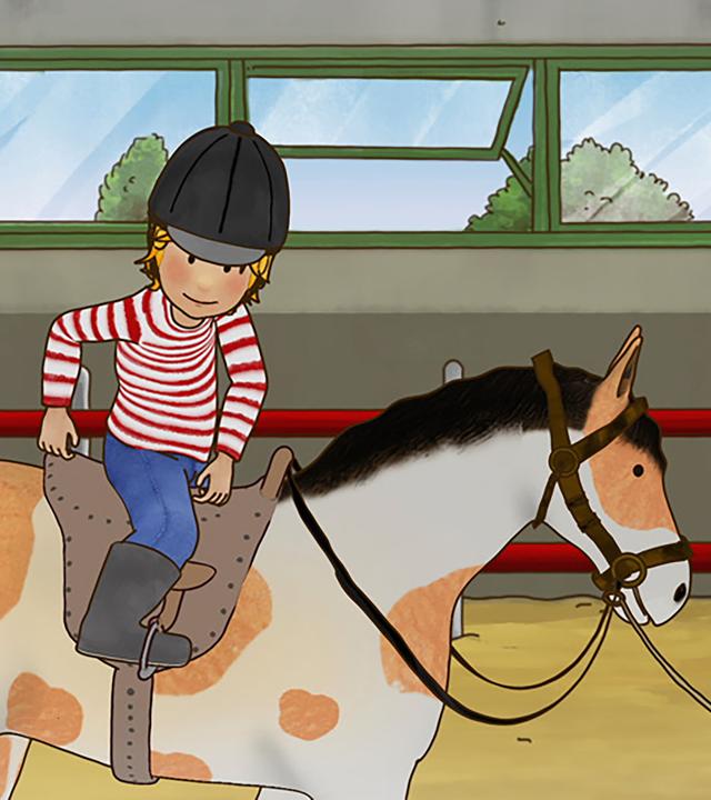 Conni sitzt auf einem Pferd und prüft ihre Haltung.