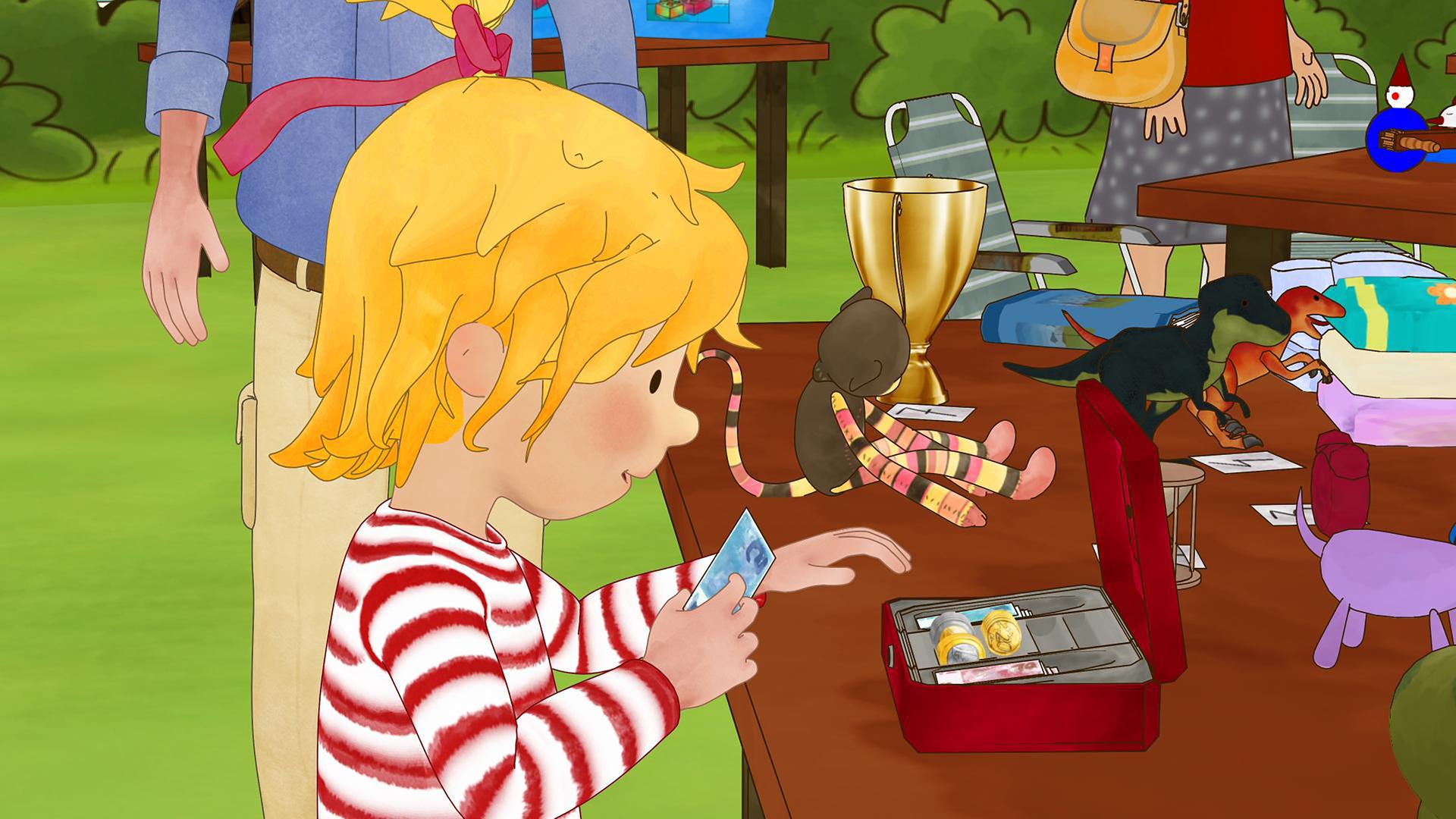 Conni hält einen Geldschein in der Hand und steht hinter ihrem Flohmarkststand. Auf diesem stehen ein Pokal, eine Geldkassette, Dinos und ein Stofftier.