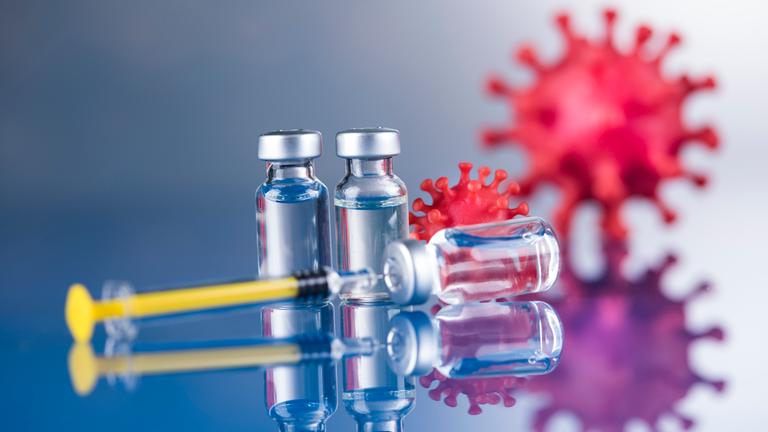 Symbolbild Imfampulle und Virus