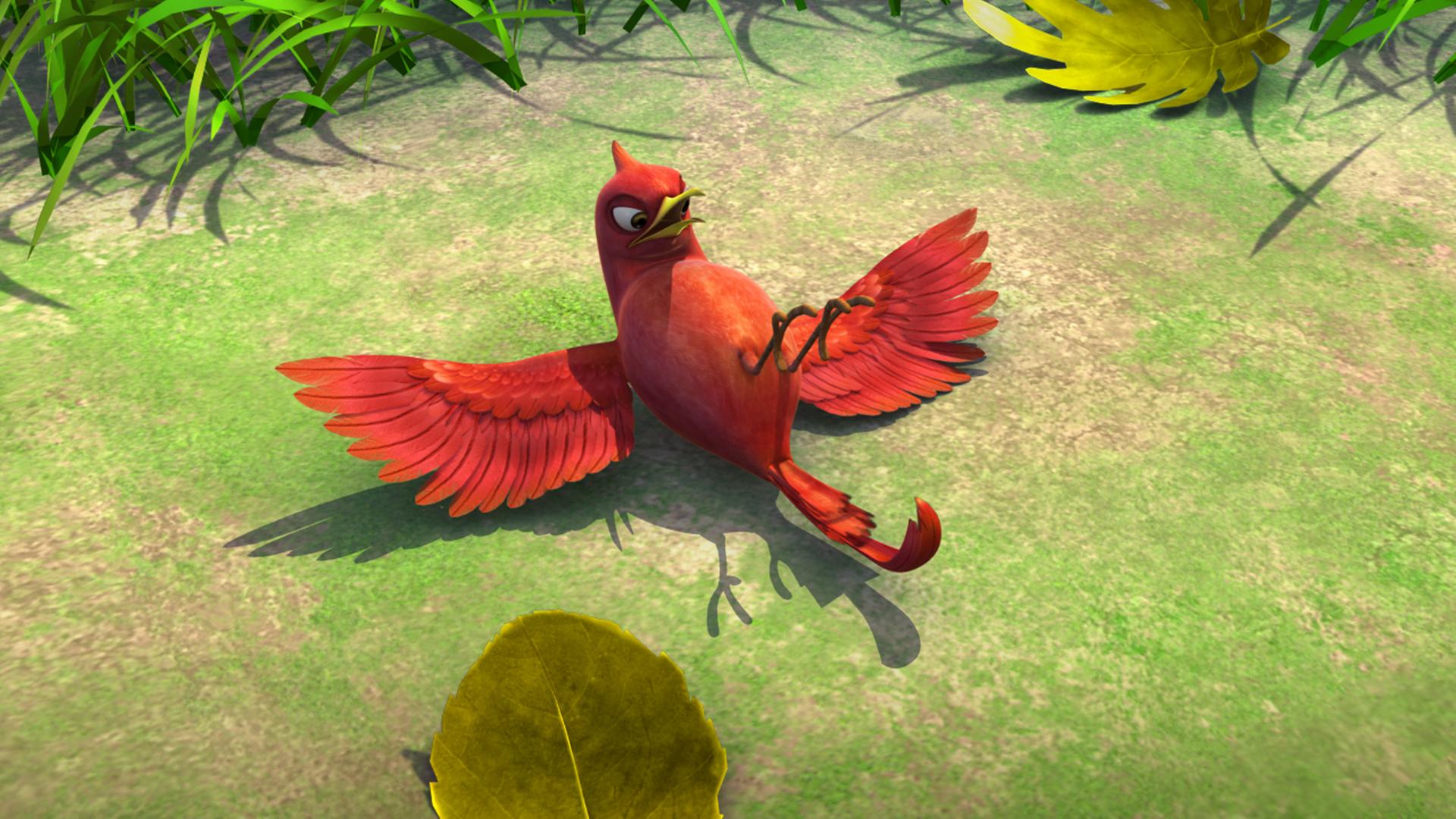 Der rote Vogel Darsi liegt auf dem Rücken auf einer Wiese.