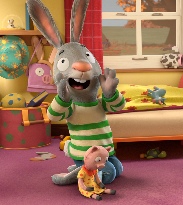 Pip und Posy sitzen auf dem Boden. Pip hält sich die Pfoten zum Rufen an den Mund. Posy sitz rechts neben ihm und hält Froschi fest. Schweinchen sitzt vor Pip auf dem Boden.