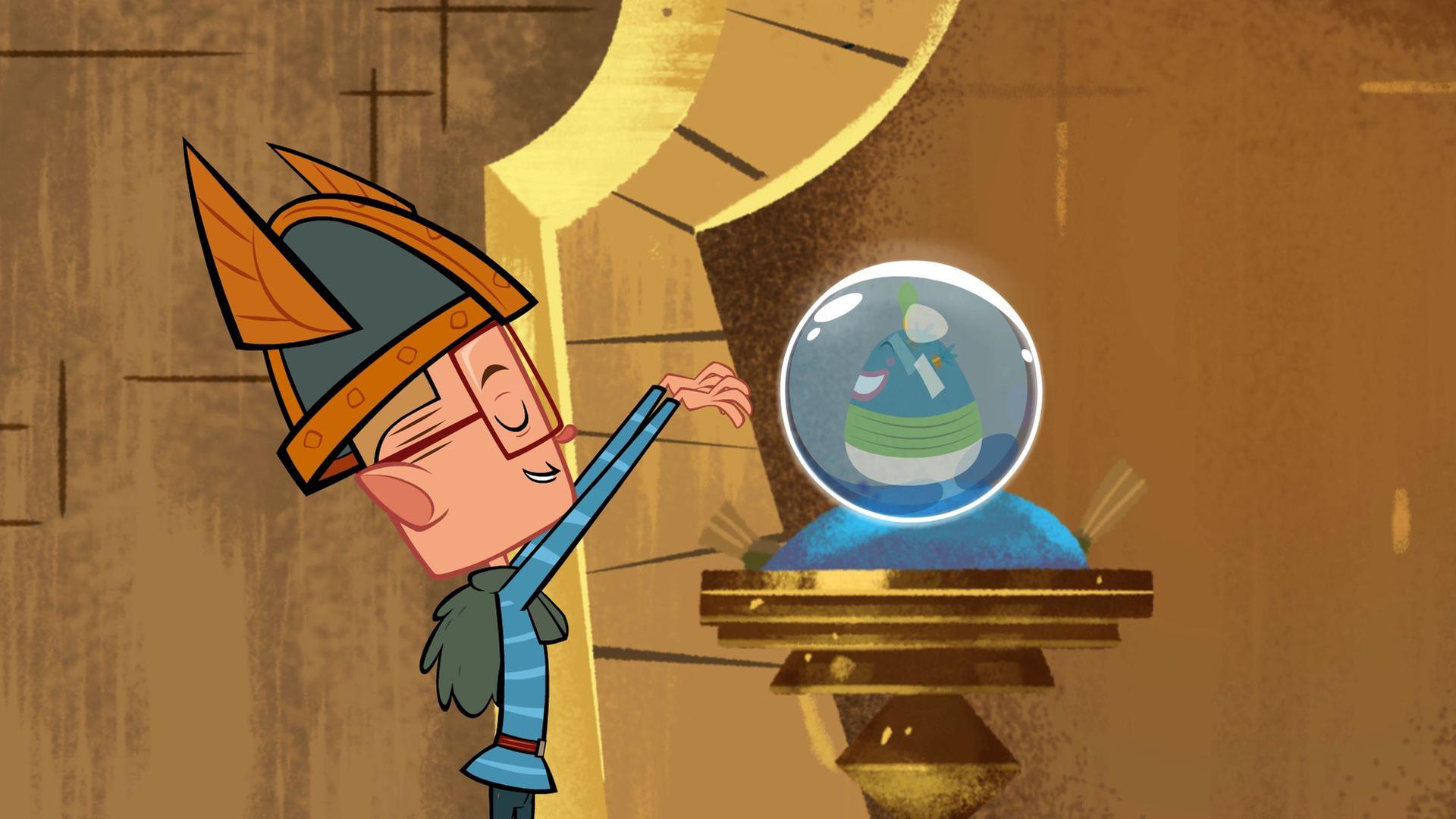 Marcus hebt seine Hände über eine Glaskugel und schließt dabei seine Augen. Die Glaskugel liegt auf einem Podest.