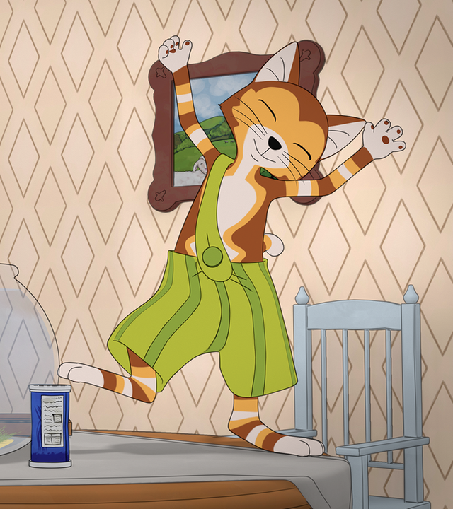 Findus fragt sich, wieso ein Stiefel im Goldfischglas steht. Er tanzt auf dem Tisch, während links neben ihm im Glas zwei Fische um einen Stiefel herumschwimmen.