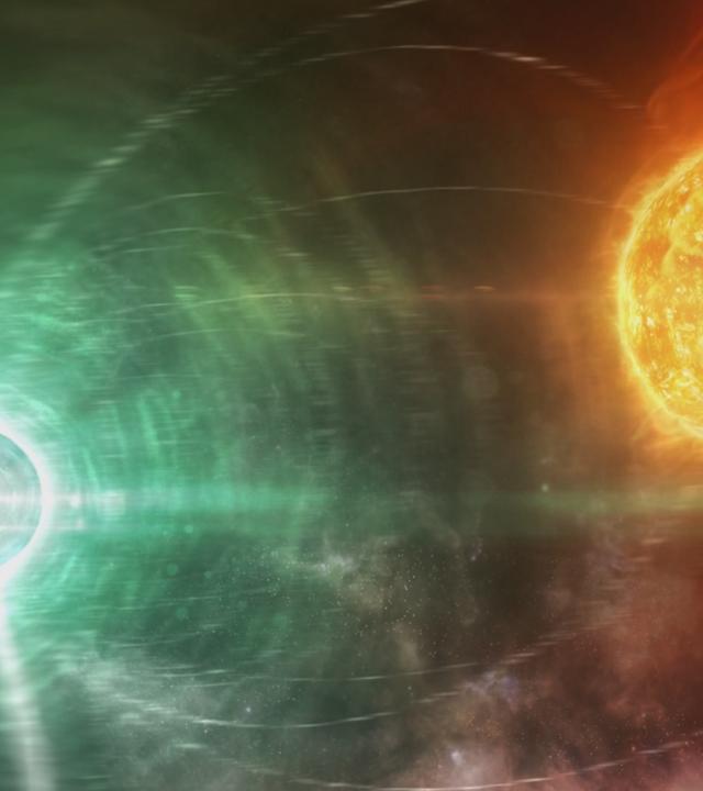 Ein Feuerball schießt auf einen Kreis zu, der grünes Licht ausstrahlt.