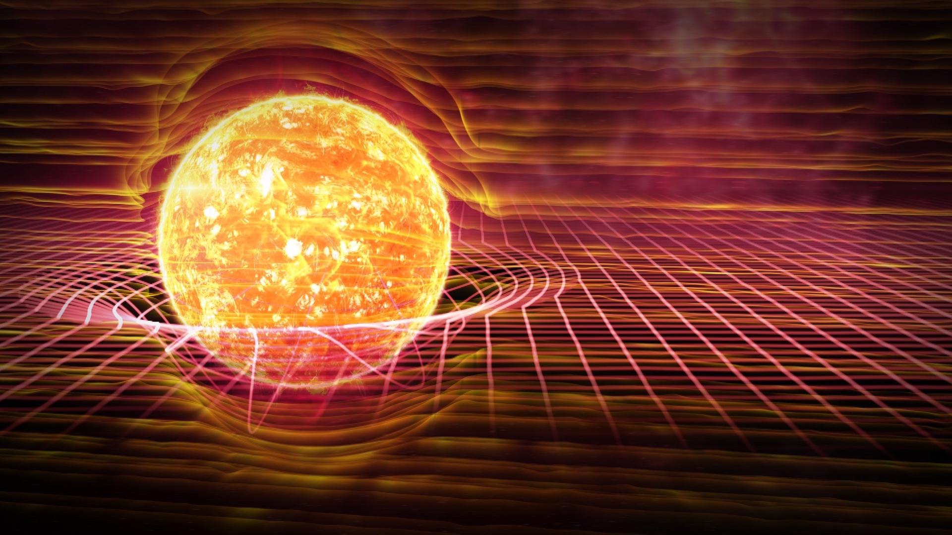 In einem roten Raster vor schwarzem Hintergrund liegt eine Kugel, die wie ein glühender Stern aussieht. Um die Kugel verformt sich das Raster.